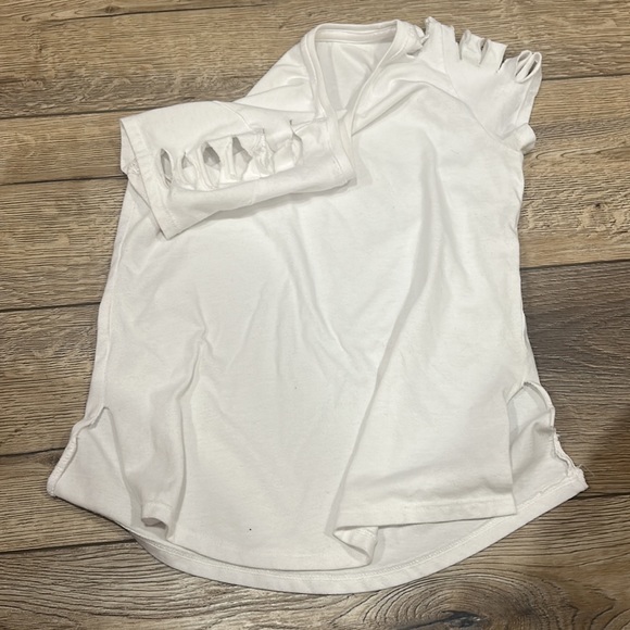 White tee slits on sleeves and on sides where made at home - Picture 4 of 4